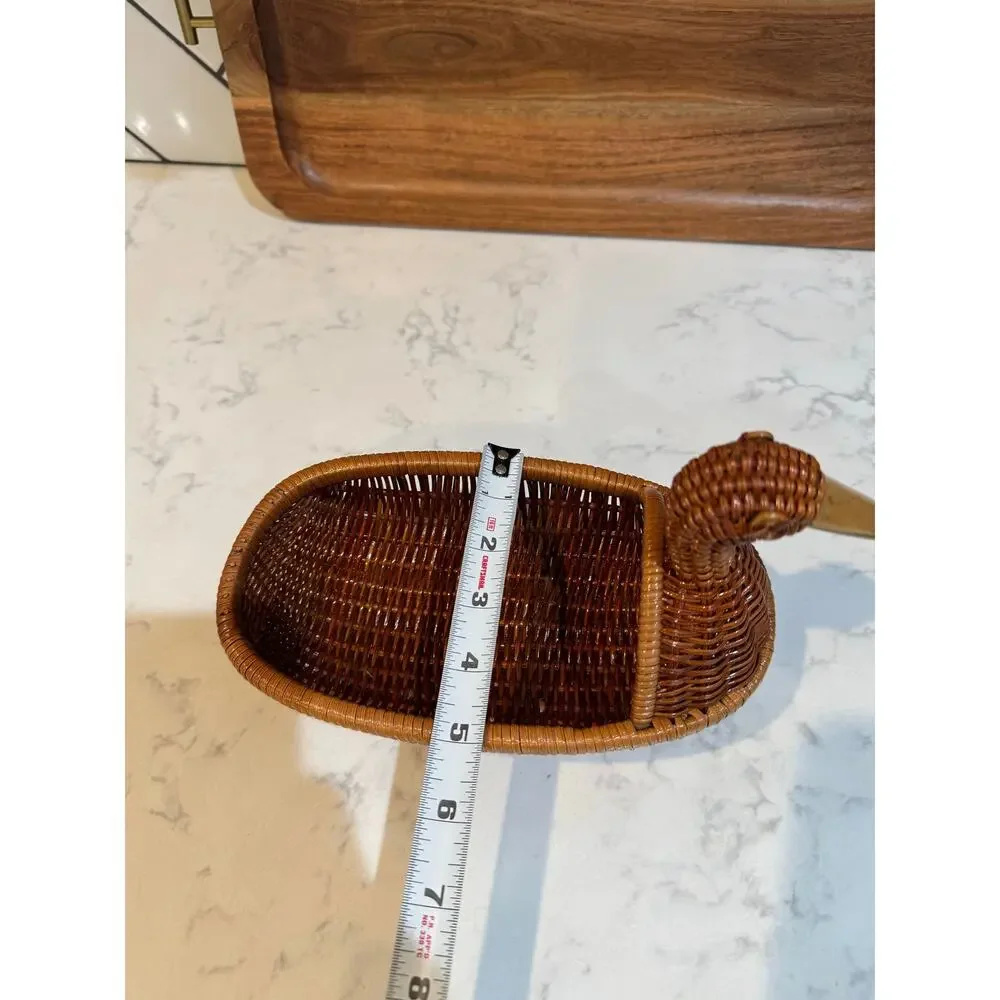 handwoven rattan duck basket elongated oval bowl design integrated duck head